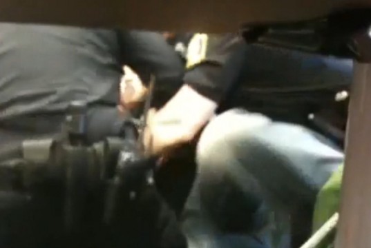 Police Student arrest Foster as she is being arrested by three officers at the University of Wisconsin, Milwaukee / United States