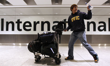 Airports reopens - nationalturk Passenger waves with joy as he finds out his plane will depart. - Photograph: Suzanne Plunkett/Reuters