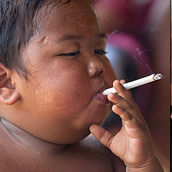 2 year old child from Indonesia is filmed smoking and is reported to have 40 a day.