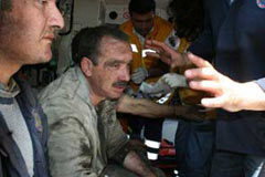 A miner who survived Mondays Gas explosion receiving treatment, in shock as 30 others all bellow ground. 