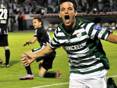 Bursa players celebrate after the own goal by Ibrahim Toraman puts the team 2-0 up.