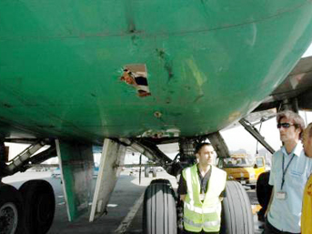 Image of huge hole in the bottom end of the Cargo Plane