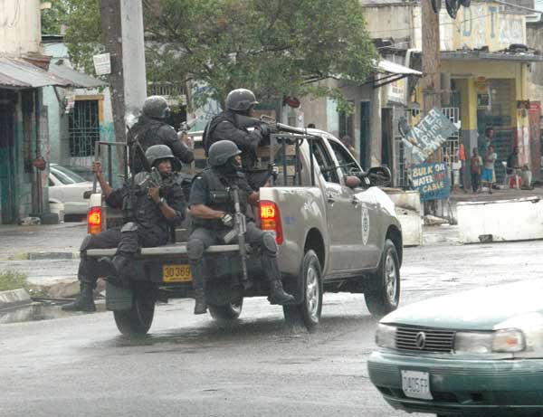 Jamaican military and officers try to re-take control of the Tivoli Gardens neighborhood of western Kingston the stronghold of Christopher “Dudus” Coke and his posse.