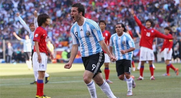 Higuain celebrates after scoring against South Korea where he helped Argentina win 4-1