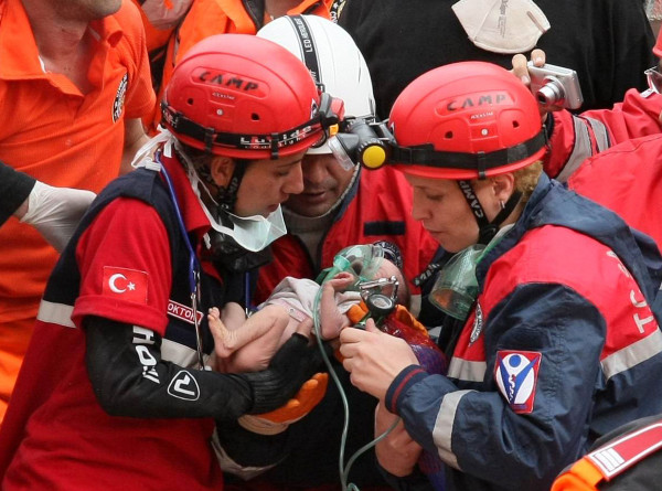 Turkish infant rescued 42 hours later Turkish rescue teams pulled an 14 day young infant, a newborn out of a collapsed building