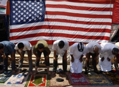 libya-post-gaddafi-prayer-nationalturk-0389 Life in Libya returns slowly to ' normal '. Friday prayers in Libya in front of flags from 'Liberators'