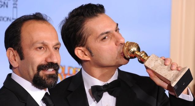 Director Asghar Farhadi (left) and actor and screenwriter Peyman Moaadi pose with their Golden Globe for best foreign language film