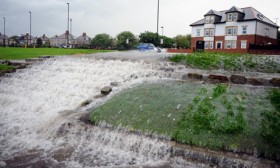 floods in UK disrupt transport, cut power and damage homes