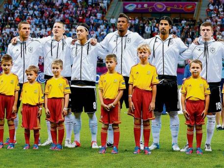 Germany : Early Euro 2012 exit stirs controversy in Germany along with National anthem polemics, Schweinsteiger was the only player singing the national anthem