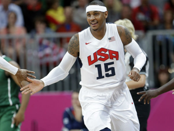 US Olympics Basketball team player Carmelo Anthony had a fun night vs Nigeria. His smile was genuine after hitting a 3-pointer vs Nigeria during a men's basketball game at the 2012 London Olympics