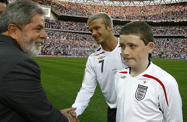 England mascot Sebbage watching as Brazil's President Lula da Silva greets England's Beckham before friendly match against Brazil in London, David Beckham England mascot Sebbage watching as Brazil's President Lula da Silva greets England's Beckham before friendly match against Brazil in London, David Beckham
