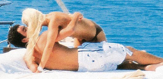 Arda Turan with Paris Hilton ( lookalike ) girl on a yacht