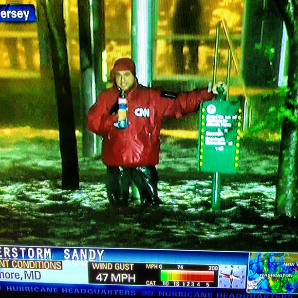 Michael Moore on CNN : Reporters standing deep in water and ready to be blown away is not News dammit