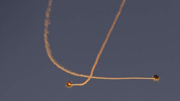 Smoke trails are seen as an Iron Dome intercepts a rocket which was launched from Gaza, near the southern town of Sderot November 15, 2012. A Hamas rocket killed three Israelis north of the Gaza Strip on Thursday, drawing the first blood from Israel as the Palestinian death toll rose to 15 in a military showdown lurching closer to all-out war with an invasion of the enclave. Smoke trails are seen as an Iron Dome intercepts a rocket which was launched from Gaza, near the southern town of Sderot November 15, 2012. A Hamas rocket killed three Israelis north of the Gaza Strip on Thursday, drawing the first blood from Israel as the Palestinian death toll rose to 15 in a military showdown lurching closer to all-out war with an invasion of the enclave.