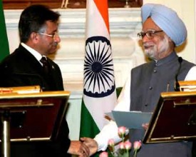ndia's Prime Minister Manmohan Singh (R)shakes hands with Pakistan's President Pervez Musharraf after making a joint statement in New Delhi April 18, 2005. Declaring their peace process irreversible, nuclear rivals India and Pakistan agreed on Monday to open up the heavily militarised frontier dividing Kashmir, capping a successful visit by Musharraf