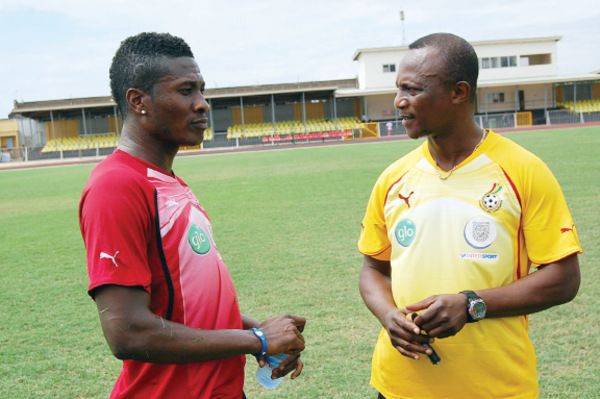 Coach Akwasi Appiah in a pep talk with striker Asamoah Gyan Coach Akwasi Appiah in a pep talk with striker Asamoah GyanCoach Akwasi Appiah in a pip talk with striker Asamoah Gyan