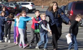 Children being escorted to safety during Connecticut shooting. File Pic