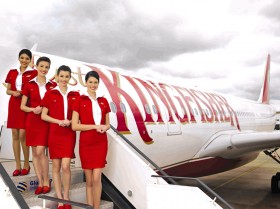 Kingfisher air-hostesses on Kingfisher plane. File Pic