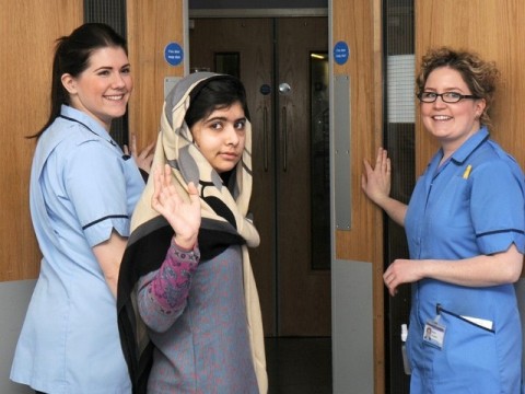 Malala Yousufzai waves as she is discharged from Queen Elizabeth Hospital, Birmingham. File pic