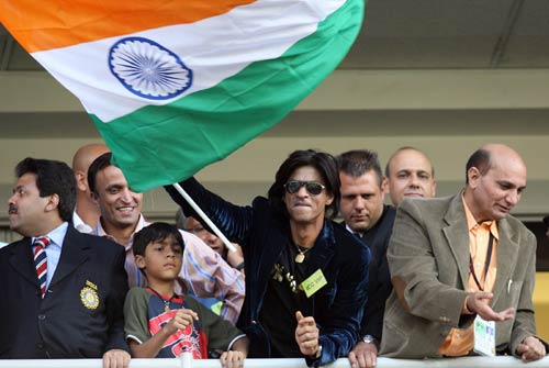 Shah Rukh Khan waiving Indian flag during a cricket match: File Pic
