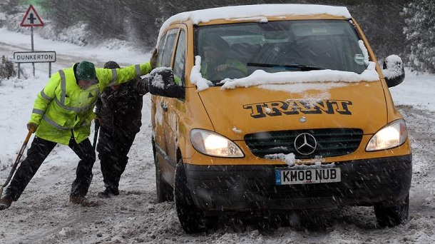 BATH, UNITED KINGDOM - JANUARY 18: A van slips in the snow on the normally busy A367 between Bath and Peasedown St John on January 18, 2013 near Bath, England. Heavy snow is bringing widespread disruption to many parts of the UK. BATH, UNITED KINGDOM - JANUARY 18: A van slips in the snow on the normally busy A367 between Bath and Peasedown St John on January 18, 2013 near Bath, England. Heavy snow is bringing widespread disruption to many parts of the UK.