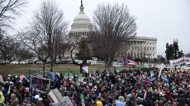 Pro-life activists march past Capitol Hill during the March for Life January 25, 2013 in Washington, DC. Pro-life activists rallied and marched to the US Supreme Court to protest the 40th anniversary of the Roe vs Wade court decision which legalized abortion throughout the United States. Pro-life activists march past Capitol Hill during the March for Life January 25, 2013 in Washington, DC. Pro-life activists rallied and marched to the US Supreme Court to protest the 40th anniversary of the Roe vs Wade court decision which legalized abortion throughout the United States.