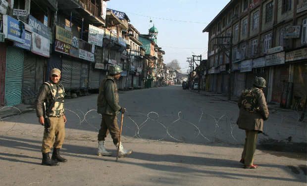 Paramilitary soldiers enforcing curfew in Kashmir. File Pic