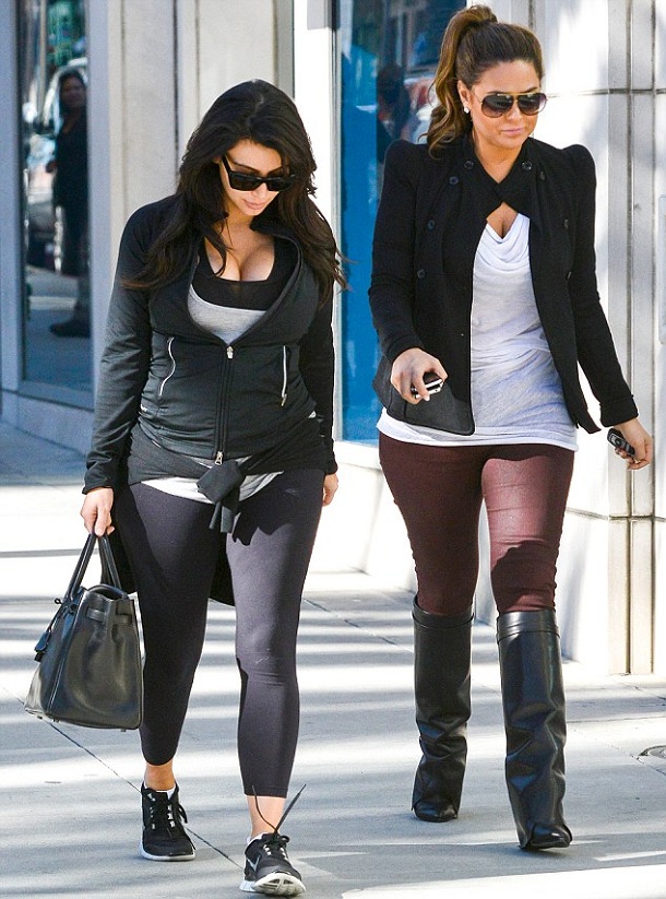 Beverly Hills, CA - Reality star Kim Kardashian squeezes her baby bump into workout clothes as she walks with a friend on Rodeo Drive in Beverly Hills. Kim was seen shopping for jewellery at the local Cartier Beverly Hills, CA - Reality star Kim Kardashian squeezes her baby bump into workout clothes as she walks with a friend on Rodeo Drive in Beverly Hills. Kim was seen shopping for jewellery at the local Cartier