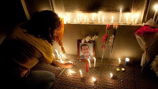 Supporters of Venezuelan President Hugo Chavez ligth candles while gathering in front of the Venezuelan embassy in Santiago, Chile on March 5, 2013, after knowing of his death. Chavez lost his battle with cancer, silencing the leading voice of the Latin American left and plunging his divided oil-rich nation into an uncertain future. Supporters of Venezuelan President Hugo Chavez ligth candles while gathering in front of the Venezuelan embassy in Santiago, Chile on March 5, 2013, after knowing of his death. Chavez lost his battle with cancer, silencing the leading voice of the Latin American left and plunging his divided oil-rich nation into an uncertain future.