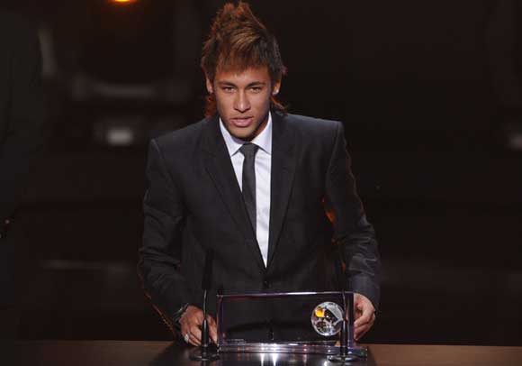 Neymar picks up the FIFA Puskas award for best goal 