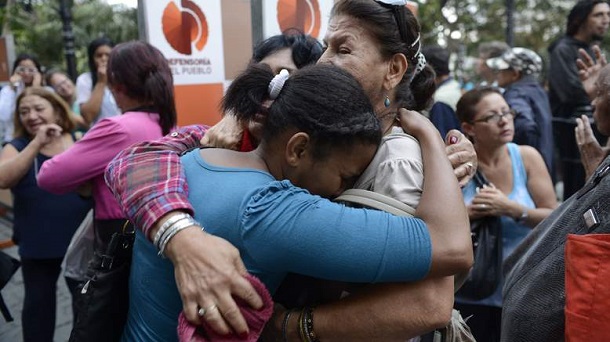 Supporters of Venezuelan President Hugo Chavez cry after knowing of his death in Caracas on March 5, 2013. Supporters of Venezuelan President Hugo Chavez cry after knowing of his death in Caracas on March 5, 2013.