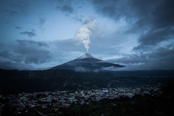 Smoke spews from Popocatepetl near Santiago Xalitzintla twilight Smoke spews from Popocatepetl near Santiago Xalitzintla twilight