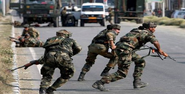 Indian soldiers taking cover during militant attack. File Pic