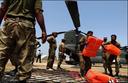 Pakistani soldiers involved in relief work in quake-hit Balochistan. File Pic
