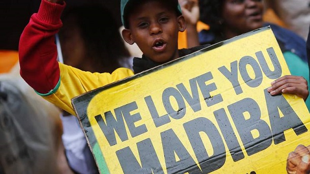 People start singing as they arrive for a mass memorial for Nelson Mandela in Johannesburg People start singing as they arrive for a mass memorial for Nelson Mandela in Johannesburg
