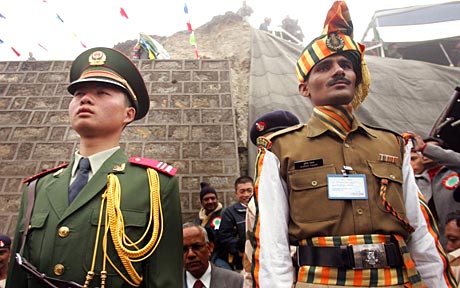 Indian and Chinese soldier in tough posturing. File Pic