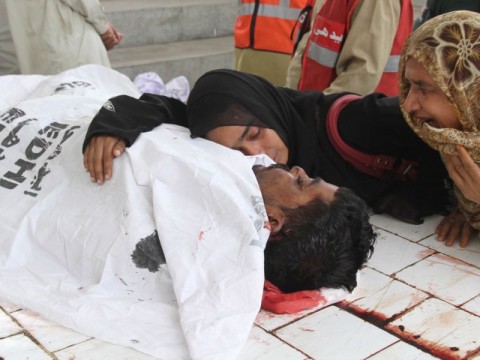Women wailing near body of relative in Pakistan. File Pic