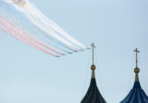 Russian military aircraft trail smoke in the colours of the Russian tricolor above the Victory Day Parade in Moscow's Red Square Russian military aircraft trail smoke in the colours of the Russian tricolor above the Victory Day Parade in Moscow's Red Square