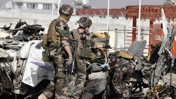 Soldiers assessing damage caused by suicide bombing in Afghanistan. File Pic
