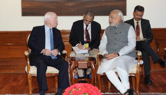 US Senator John McCain holding talks with Indian PM Narendra Modi.