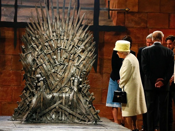 Her Majesty Queen Elizabeth looks at the Iron Throne as she meets cast members on the set of TV series Game of Thrones in Belfast Her Majesty Queen Elizabeth looks at the Iron Throne as she meets cast members on the set of TV series Game of Thrones in Belfast