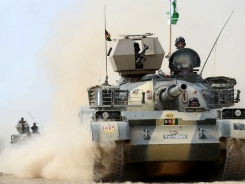 Pakistani tanks patrol outside the cordoned area in North Wazirastan agency. File Pic