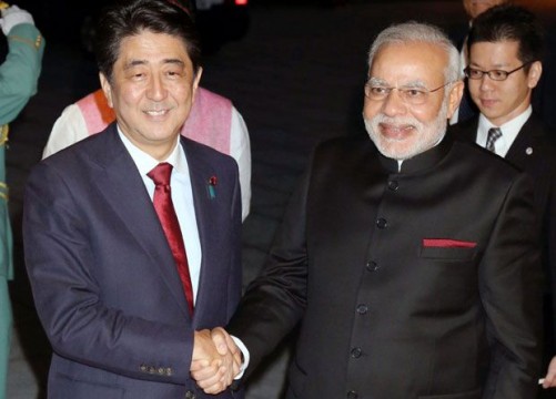 Japanese PM shaking hands with Indian PM. File Pic