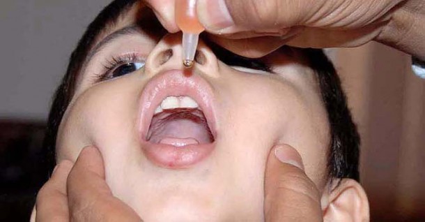 A boy being administered anti-polio drops in Pakistan. File pic