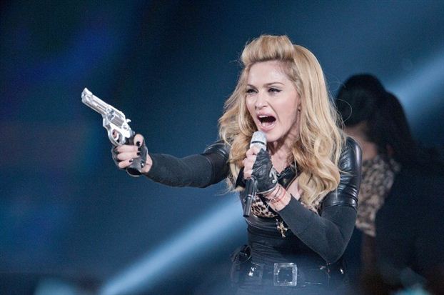 National Front sues Madonna over Le Pen swastika shown at the concert ...