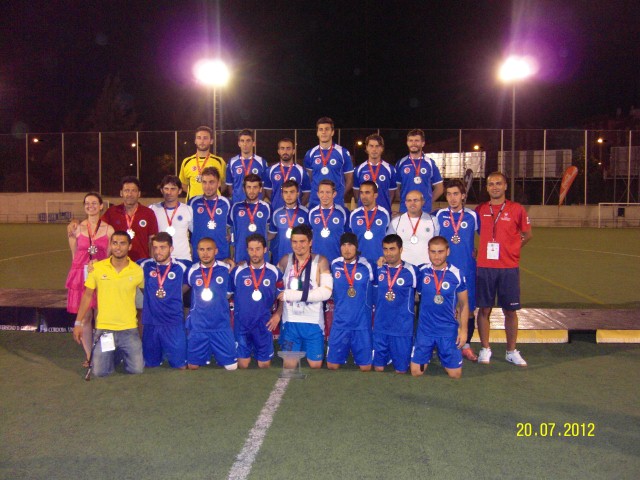 Muslum Gulhan with his champions, Halic University from Istanbul won the European Football Championship for universities in 2012
