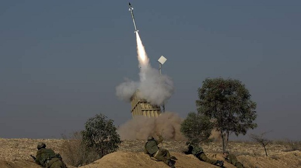 The Israeli military launch a missile from the Iron Dome missile system ...