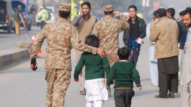 Army troops killed seven militants who stormed a military-run school in the northwestern city of Peshawar Tuesday, the Pakistani government said.