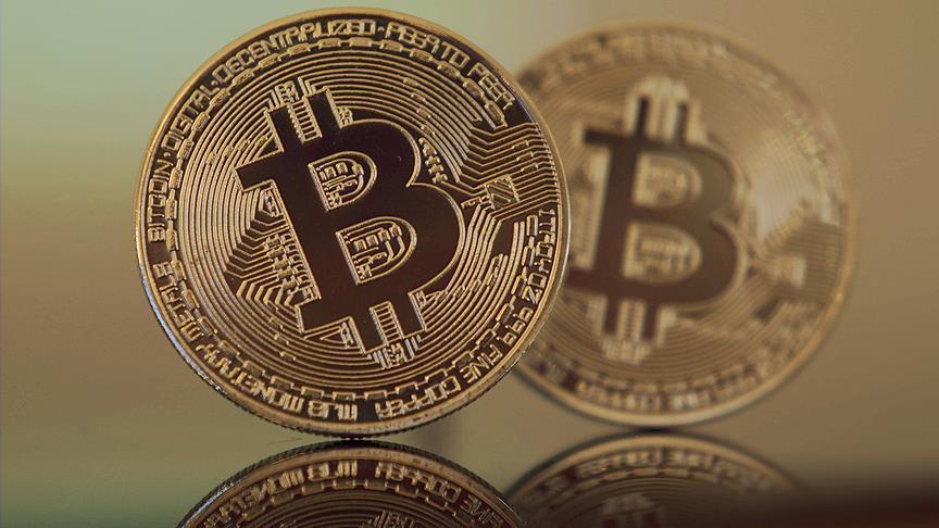 Bitcoin drops 13 percent to below $9,000