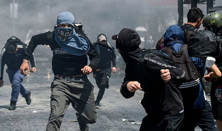 Clashes between Chilean students and police in the capital of Chile, Santiago.